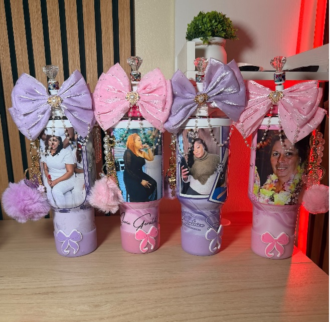 Custom photo tumblers with bows and rhinestone charms made for happy customers